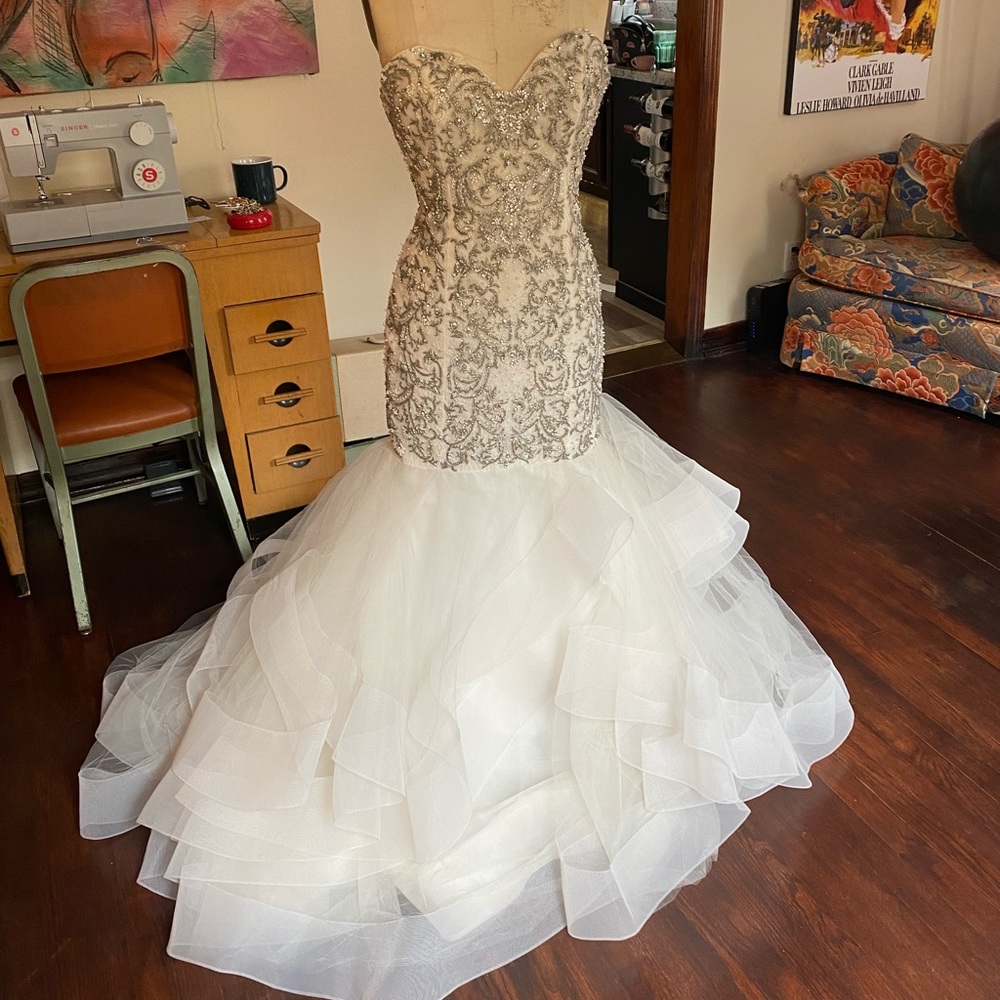 Gorgeously beaded wedding dress. StoreSample
